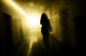 4939650 - woman with psychic pressure in a corridor